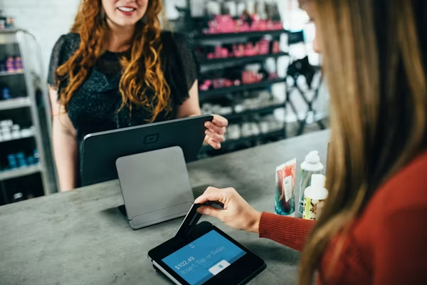 Staff helping customer